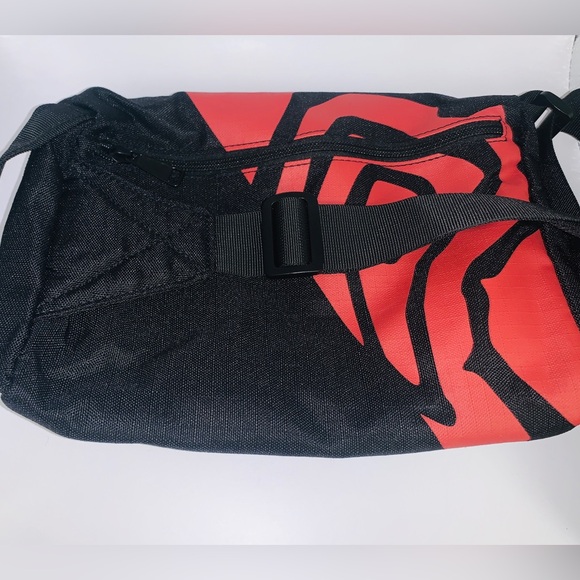 New Chipotle Mexican Grill sling back / backpack / black with red chili … - Picture 8 of 9